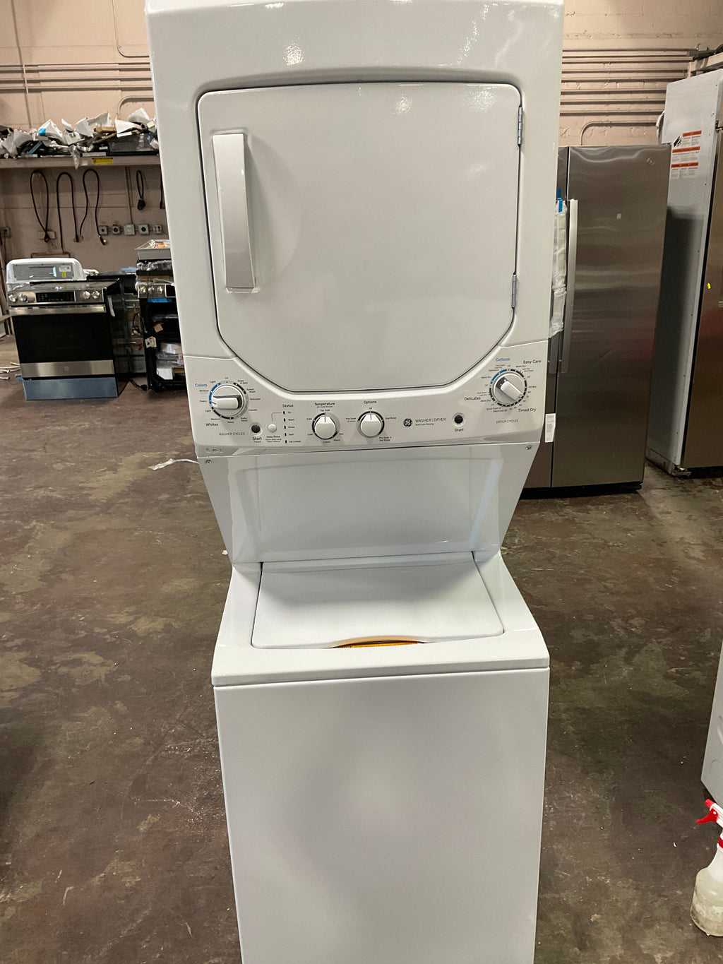 GE Unitized Spacemaker® 2.3 cu. ft. Capacity Washer with Stainless Steel Basket and 4.4 cu. ft. Capacity Gas Dryer
