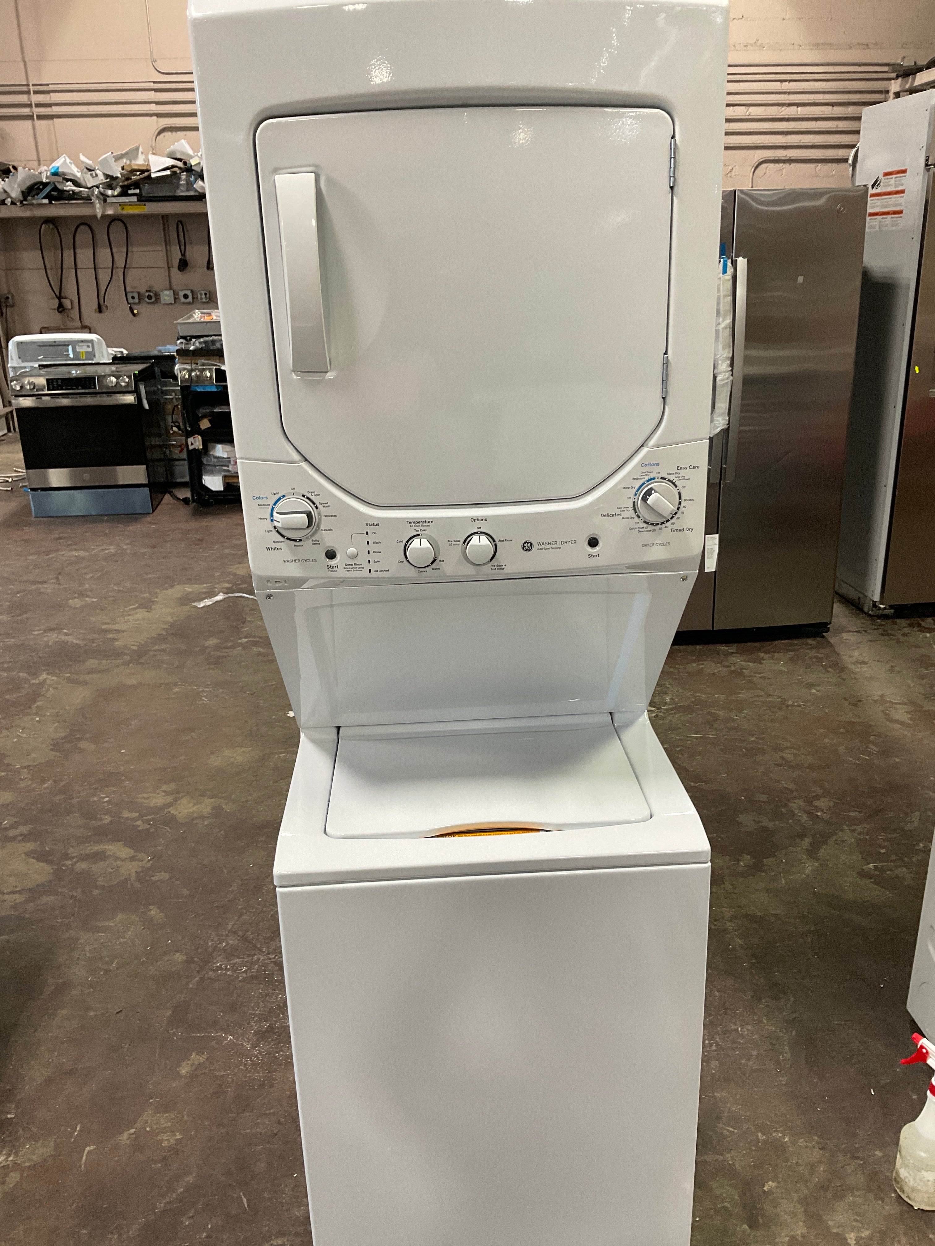 GE Unitized Spacemaker® 2.3 cu. ft. Capacity Washer with Stainless Steel Basket and 4.4 cu. ft. Capacity Gas Dryer