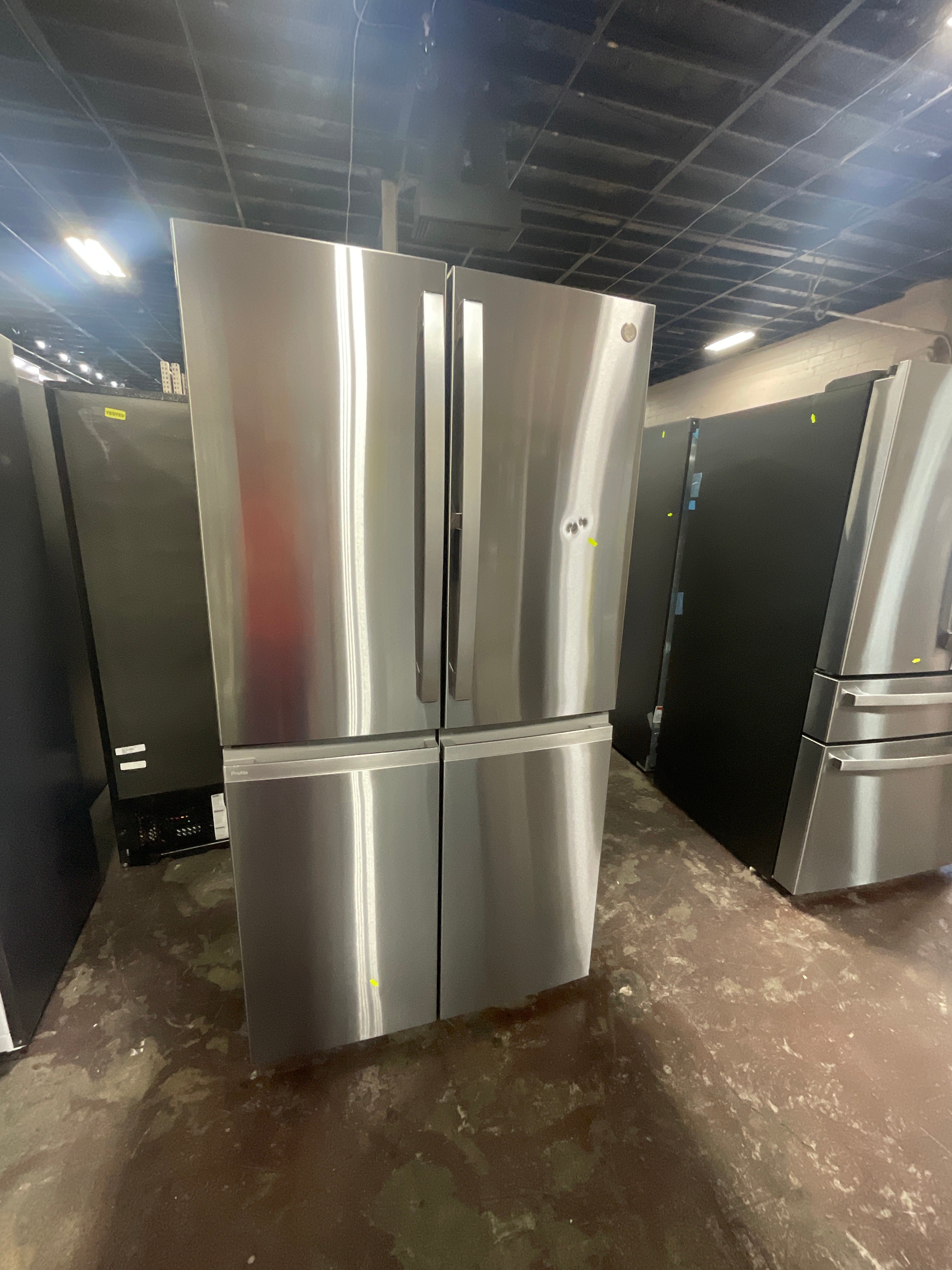 GE Profile™ ENERGY STAR® 28.4 Cu. Ft. Quad-Door Refrigerator with Dual-Dispense AutoFill Pitcher and Door in Door