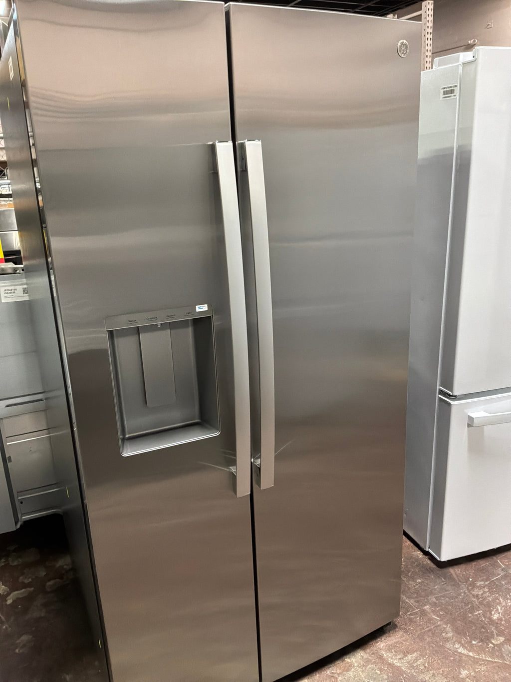 GE® 27.7 Cu. Ft. Side-By-Side Refrigerator with LED Light Walls, Extra Tall Dispenser, and Antimicrobial Refrigerator Drawer Liners