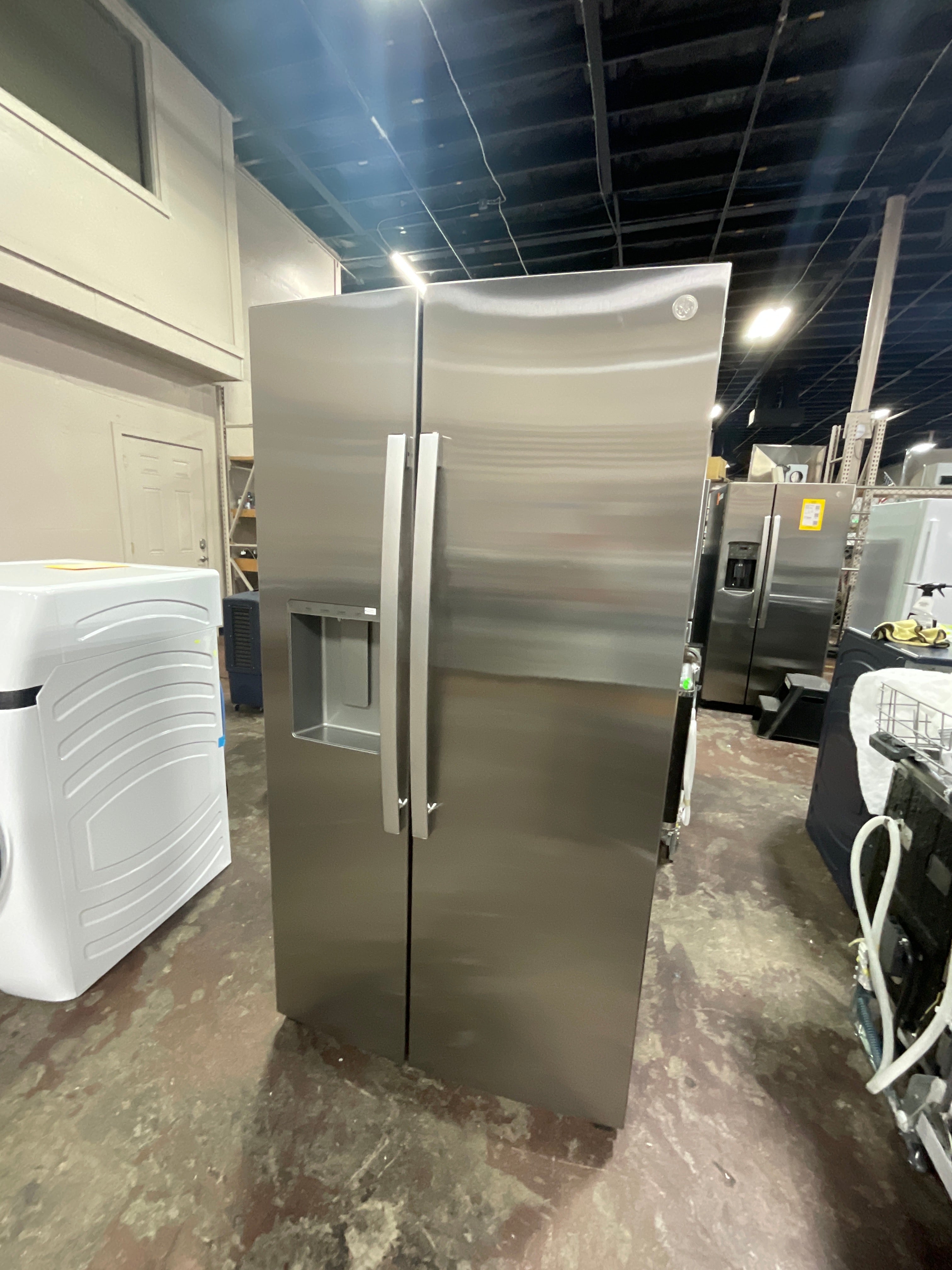 GE® 23.5 Cu. Ft. Counter-Depth Side-By-Side Refrigerator with LED Light Walls and Extra Tall Dispenser