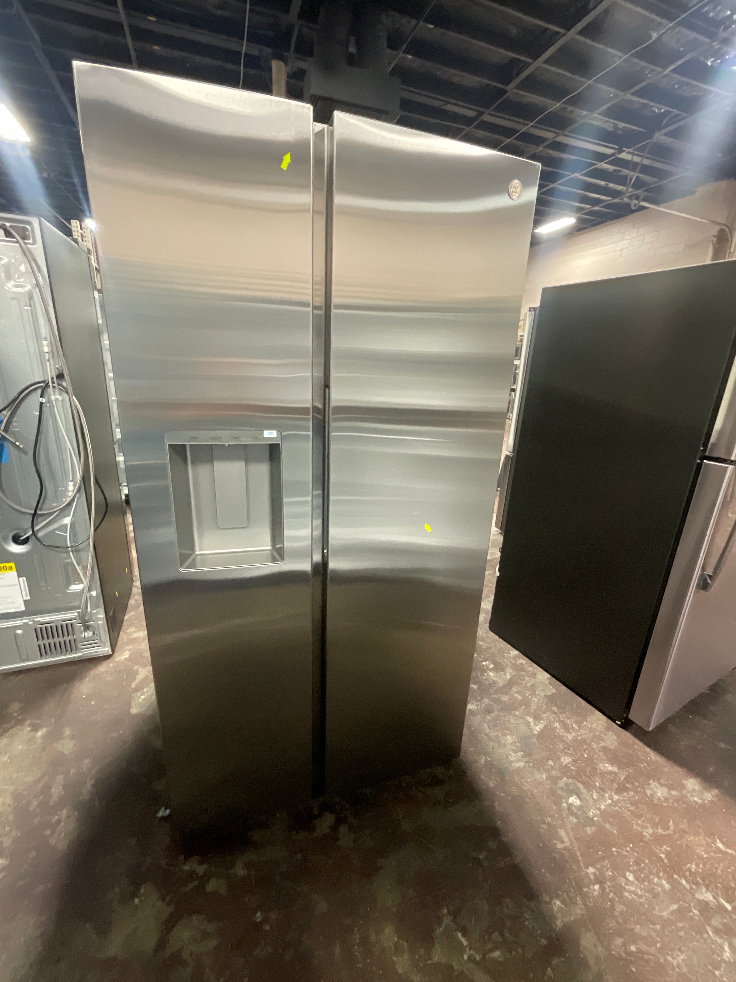 GE® 27.7 Cu. Ft. Side-By-Side Refrigerator with LED Light Walls, Extra Tall Dispenser, and Integrated Handles