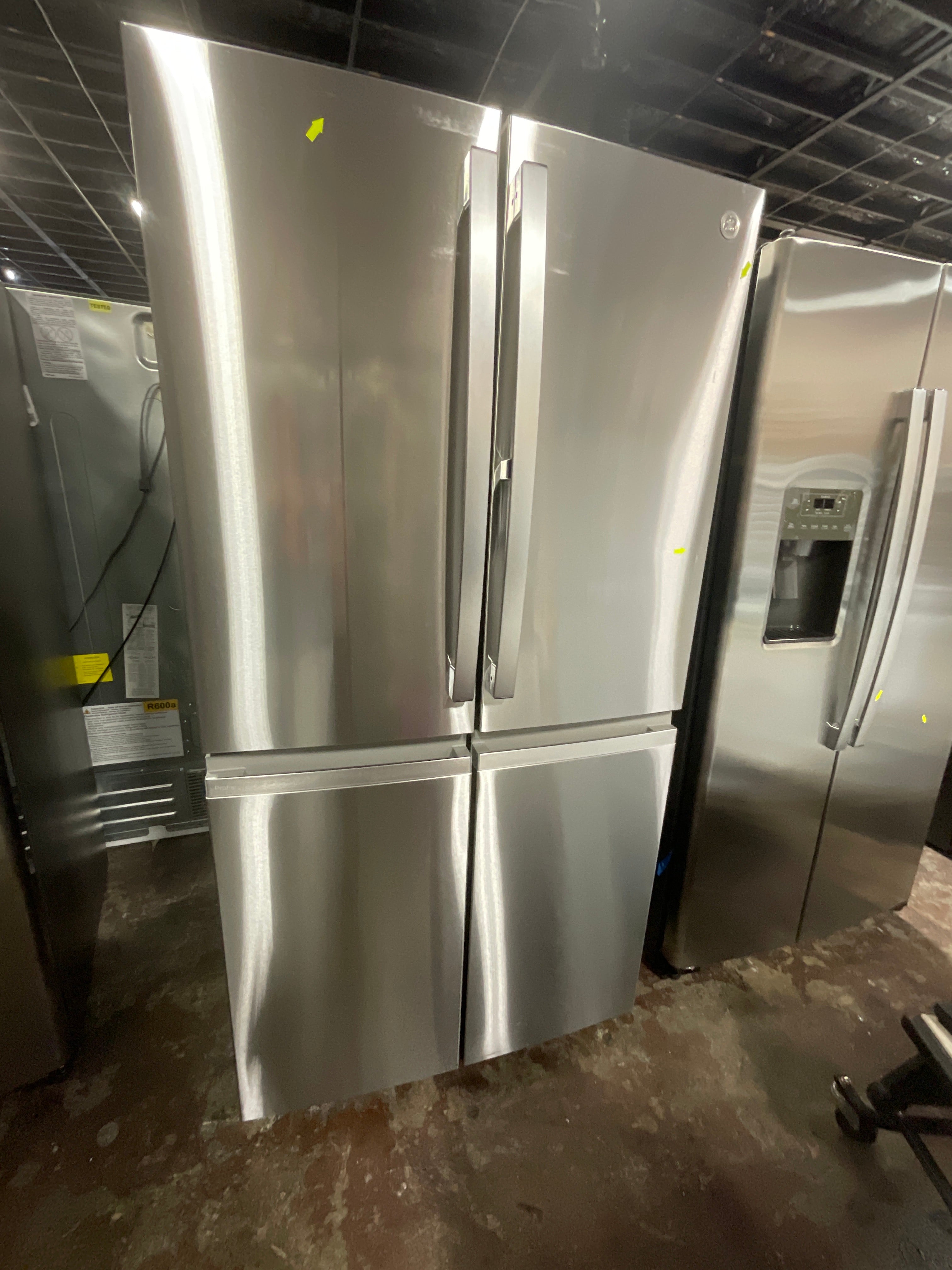 GE Profile™ ENERGY STAR® 28.4 Cu. Ft. Quad-Door Refrigerator with Dual-Dispense AutoFill Pitcher and Door in Door