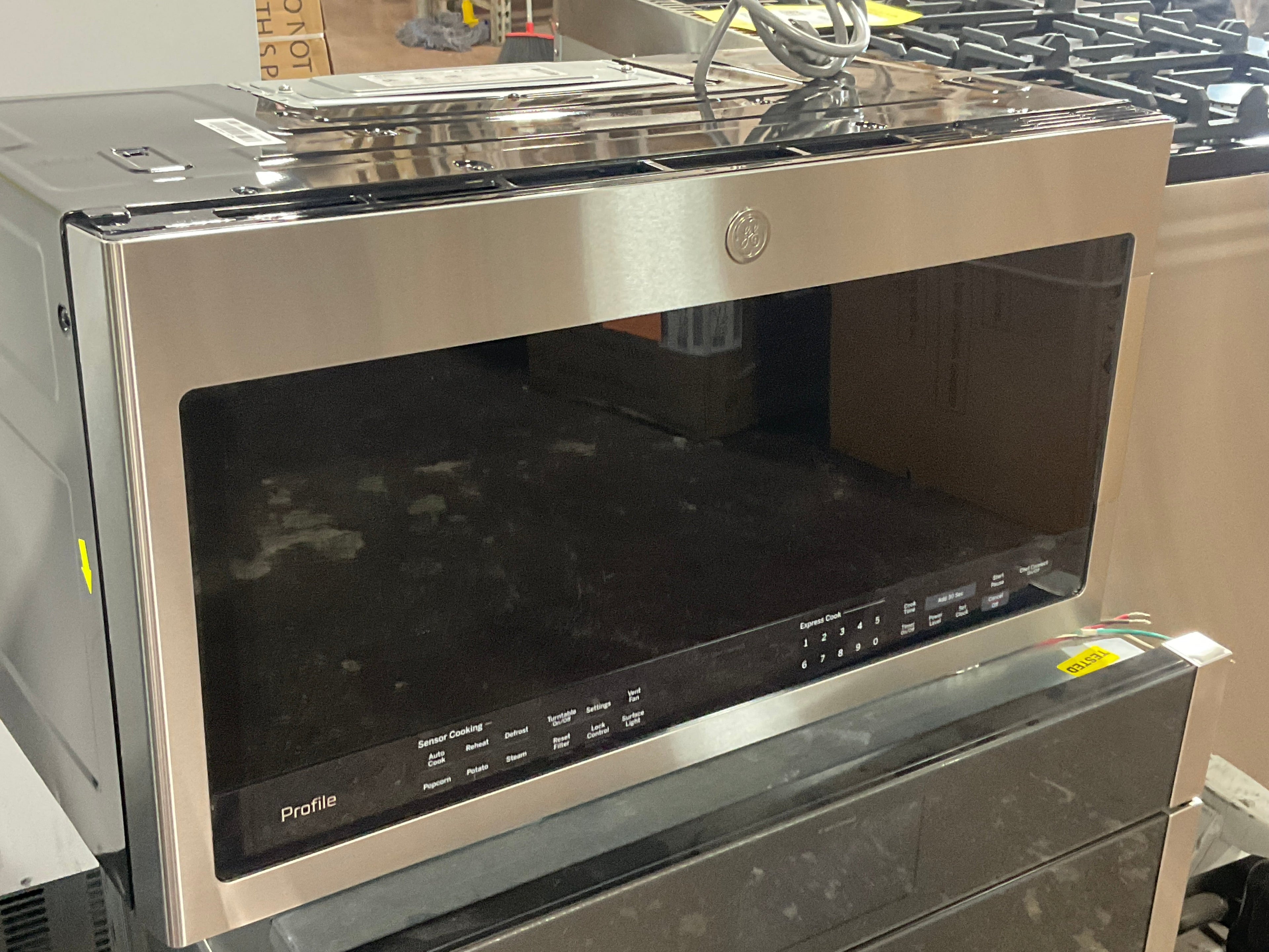 GE Profile™ 2.1 Cu. Ft. Over-the-Range Sensor Microwave Oven