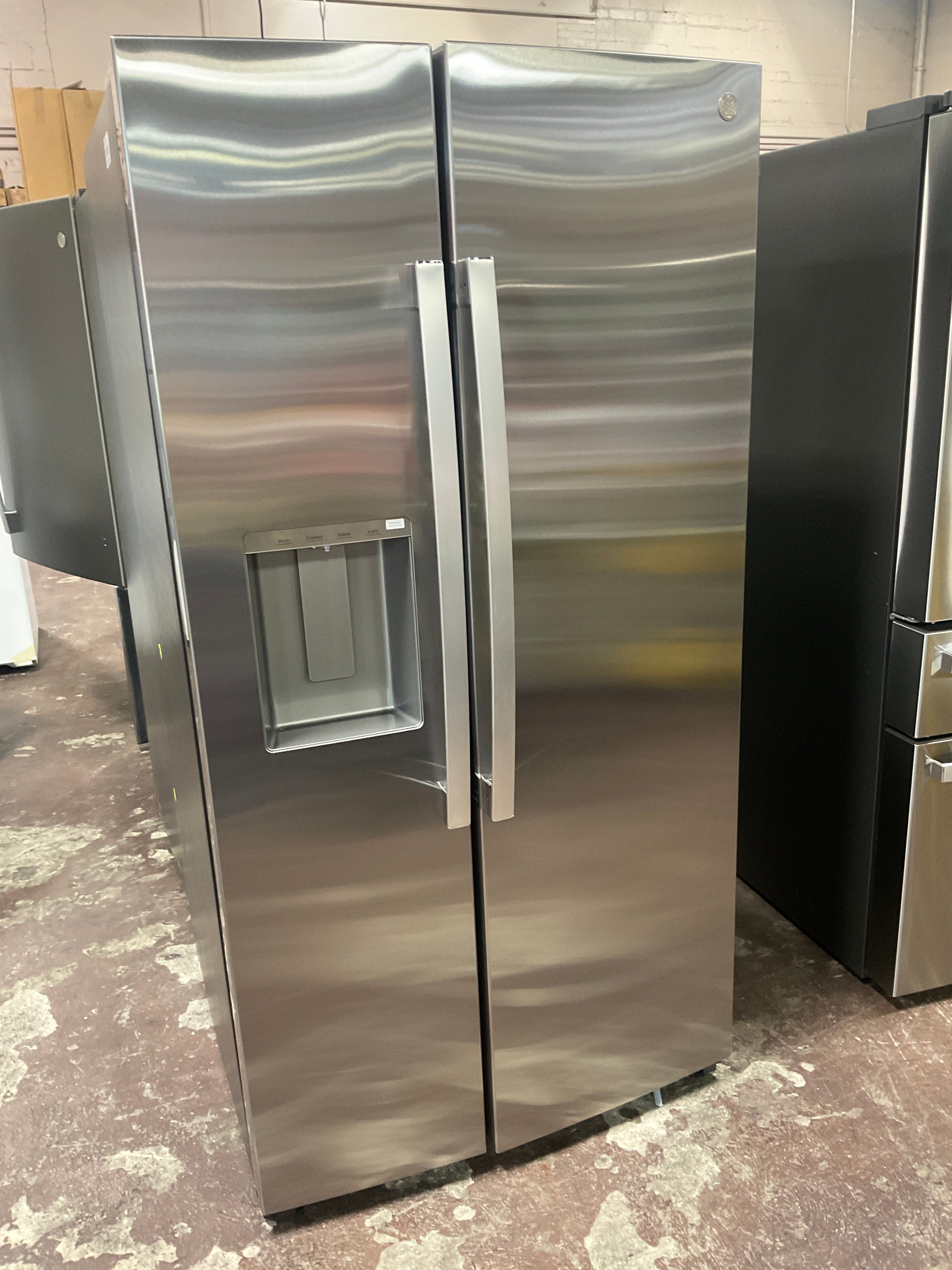 GE® 27.9 Cu. Ft. Side-By-Side Refrigerator with Extra Tall Dispenser and In-Door Icemaker