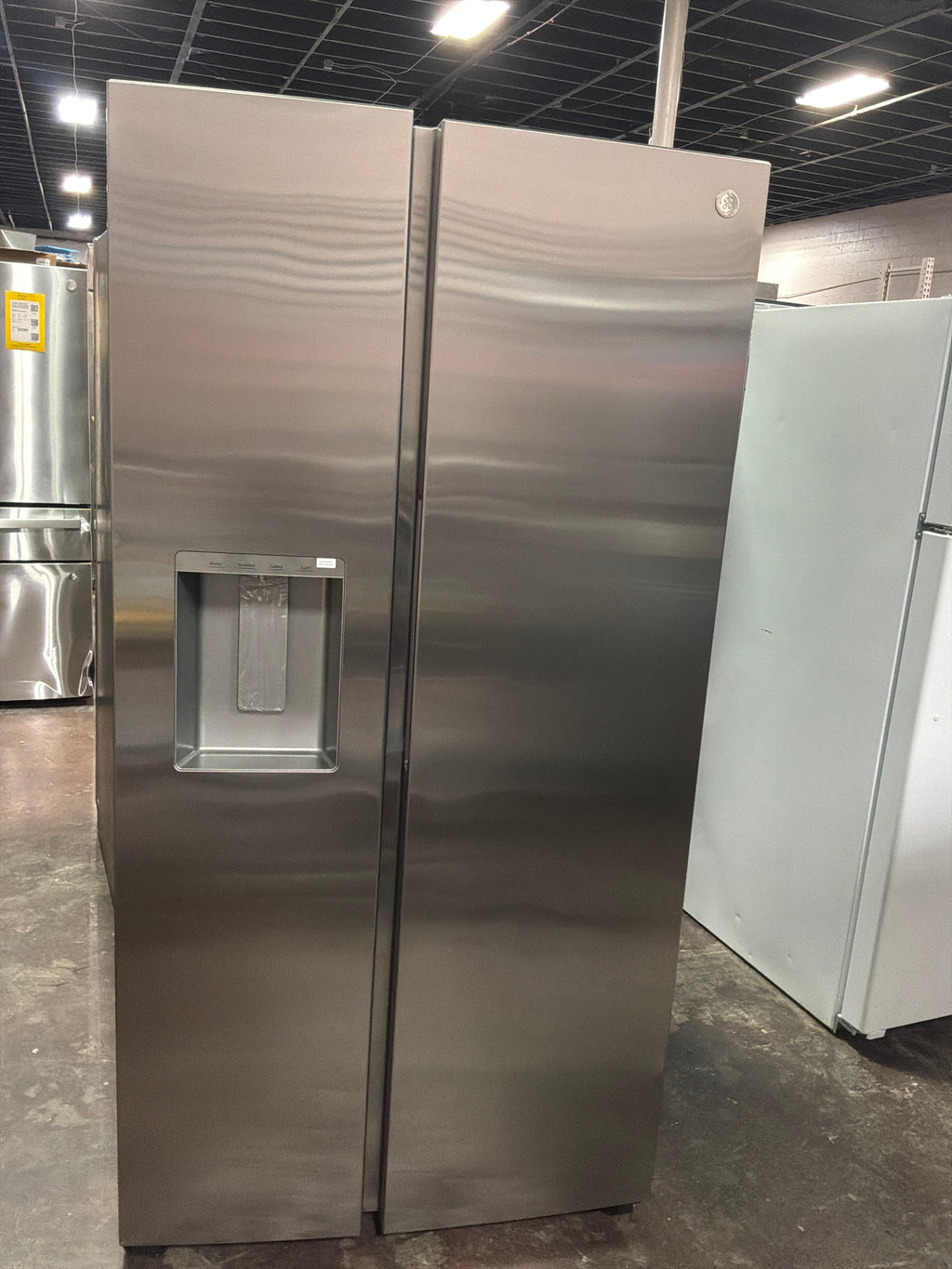 GE® 27.7 Cu. Ft. Side-By-Side Refrigerator with LED Light Walls, Extra Tall Dispenser, and Integrated Handles