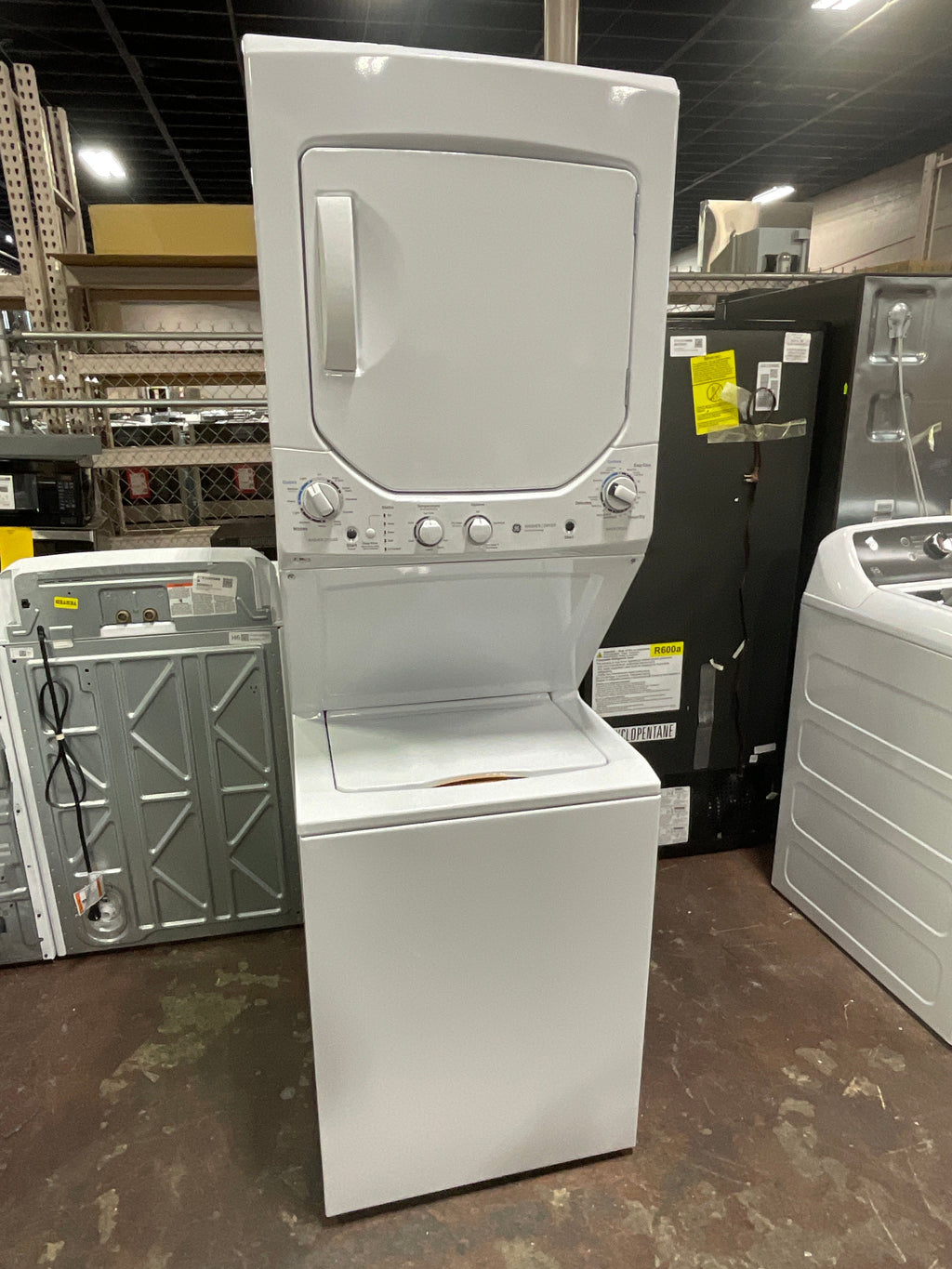 GE Unitized Spacemaker® 2.3 cu. ft. Capacity Washer with Stainless Steel Basket and 4.4 cu. ft. Capacity Gas Dryer