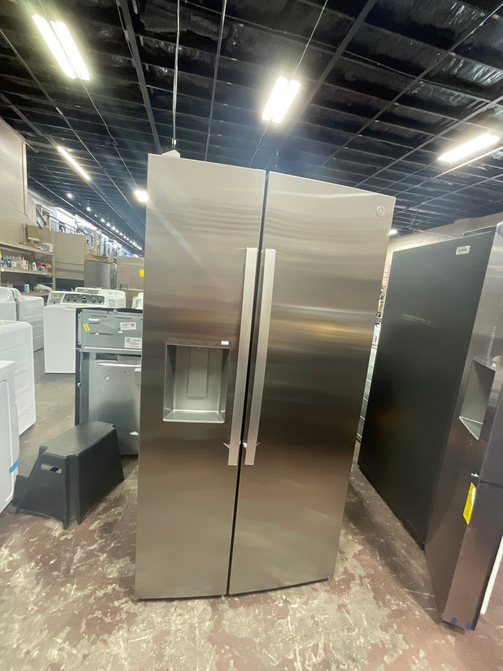 GE® 27.7 Cu. Ft. Side-By-Side Refrigerator with LED Light Walls, Extra Tall Dispenser, and Antimicrobial Refrigerator Drawer Liners