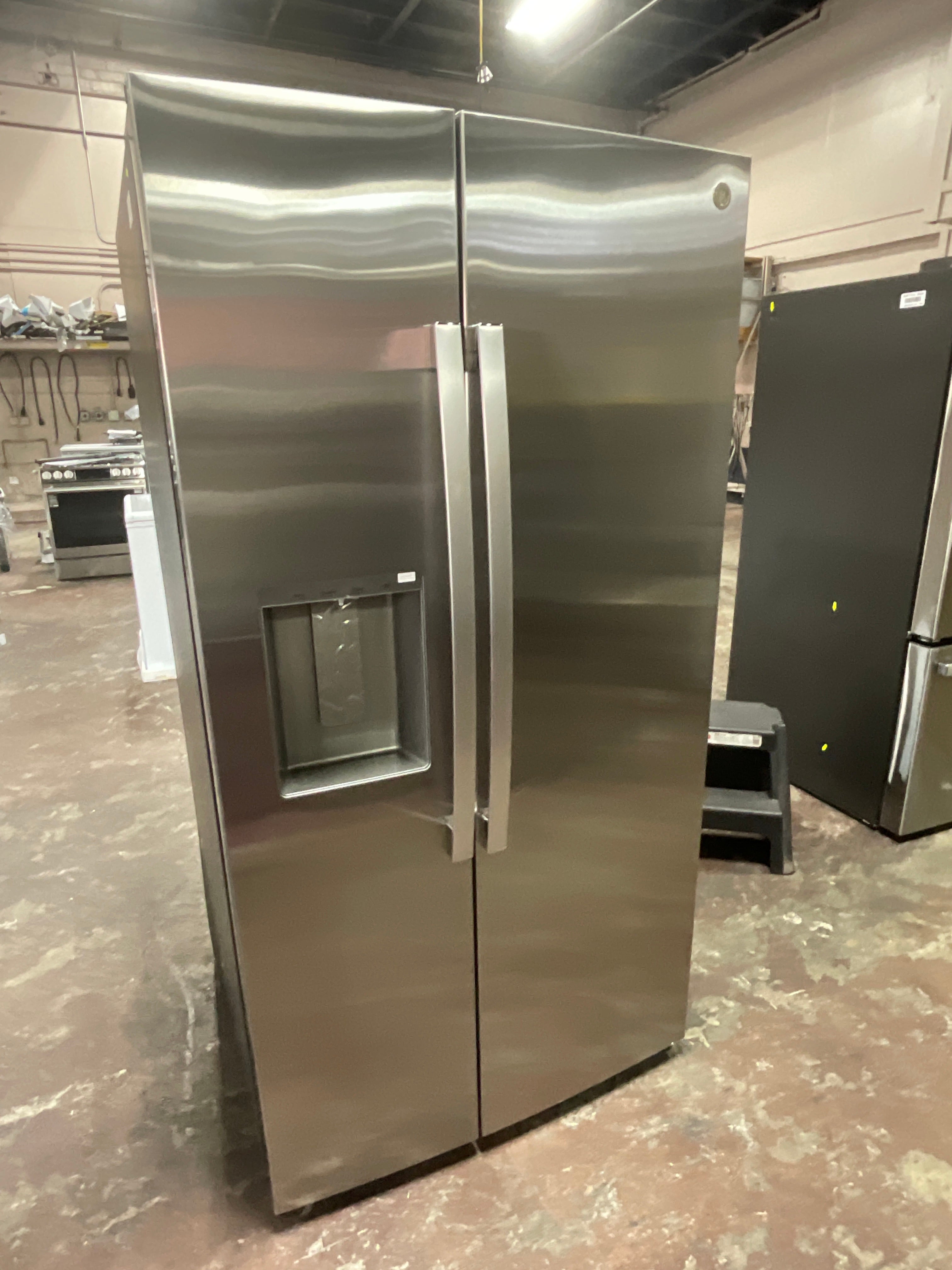 GE® 27.9 Cu. Ft. Side-By-Side Refrigerator with Extra Tall Dispenser and In-Door Icemaker