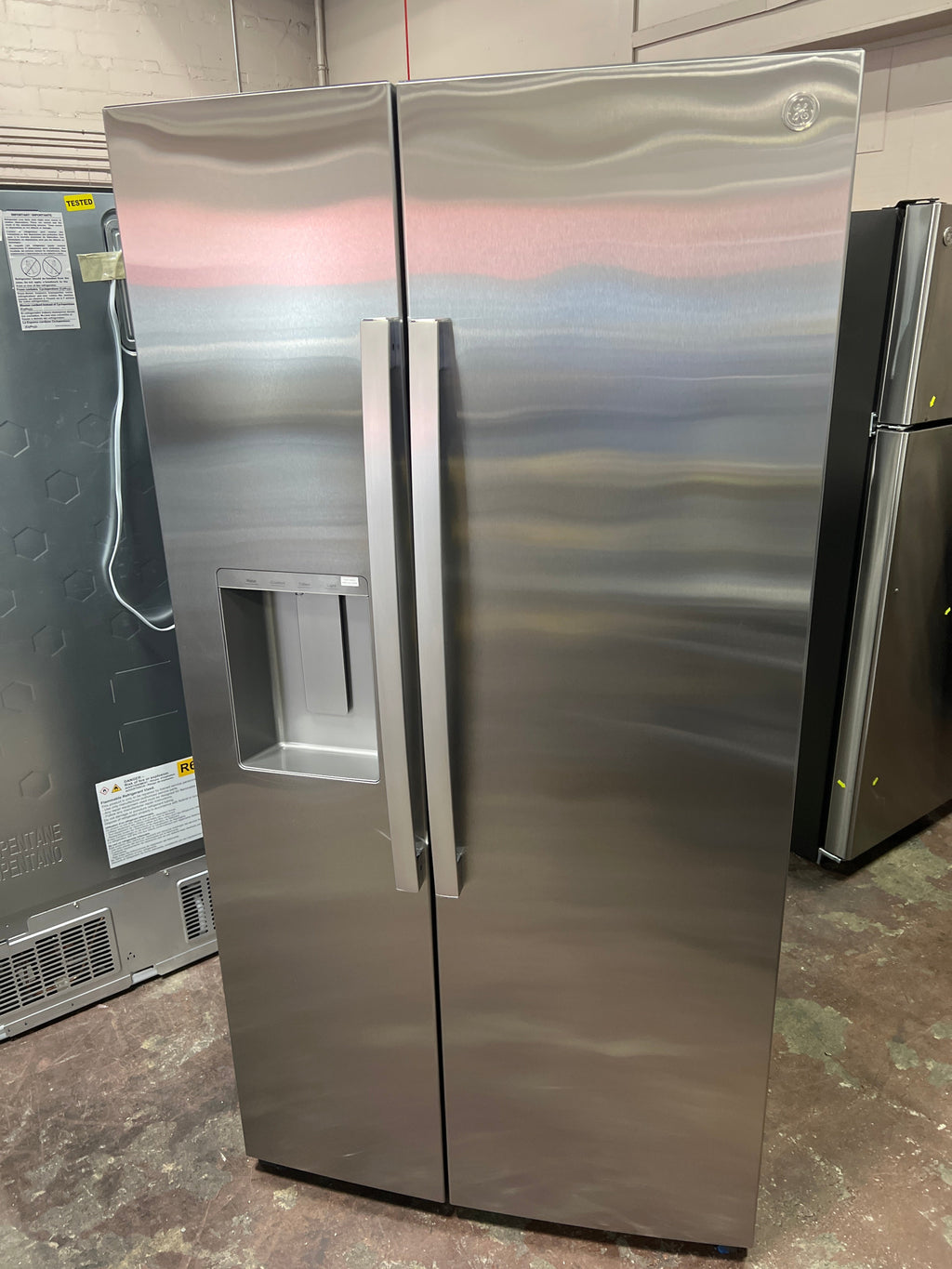 GE® 27.9 Cu. Ft. Side-By-Side Refrigerator with Extra Tall Dispenser and In-Door Icemaker