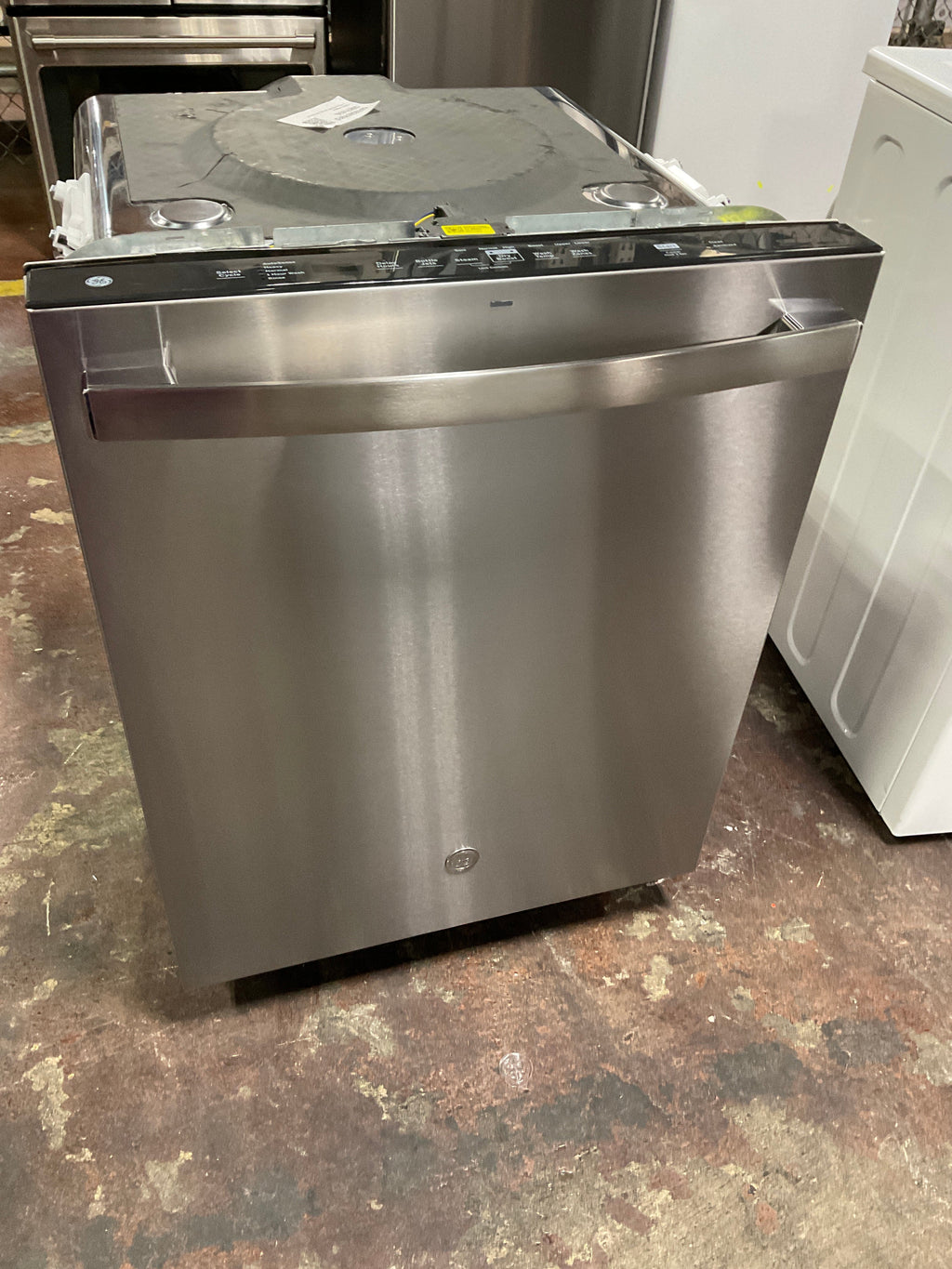 GE GE® ENERGY STAR® Top Control with Plastic Interior Dishwasher with Sanitize Cycle & Dry Boost