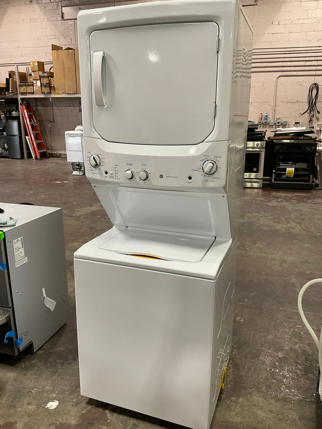 GE Unitized Spacemaker® 3.8 cu. ft. Capacity Washer with Stainless Steel Basket and 5.9 cu. ft. Capacity Electric Dryer