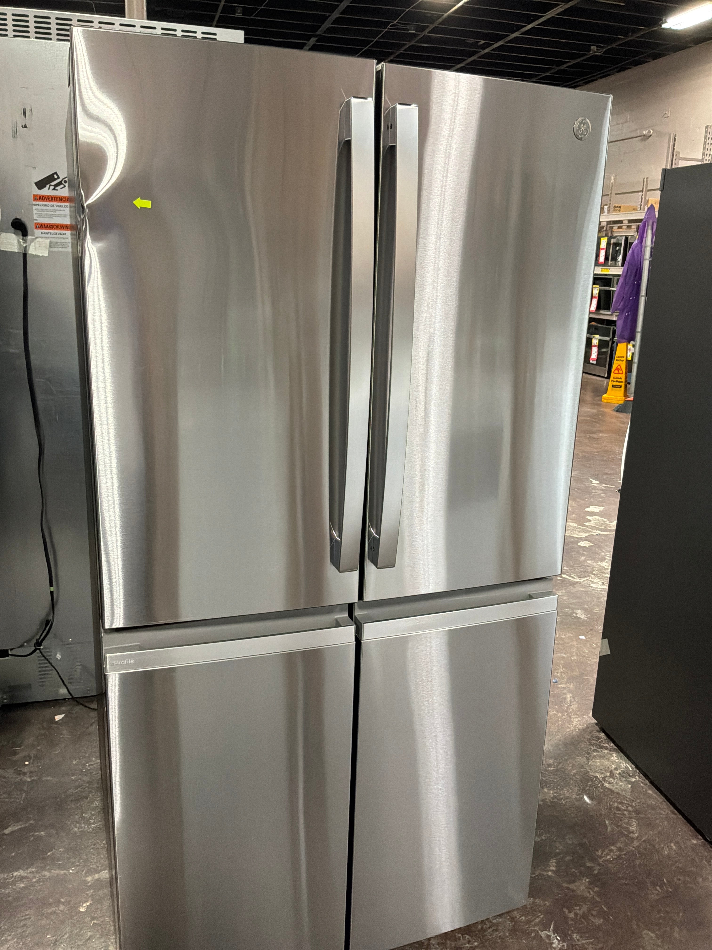 GE Profile™ ENERGY STAR® 28.3 Cu. Ft. Quad-Door Refrigerator with Dual-Dispense AutoFill Pitcher