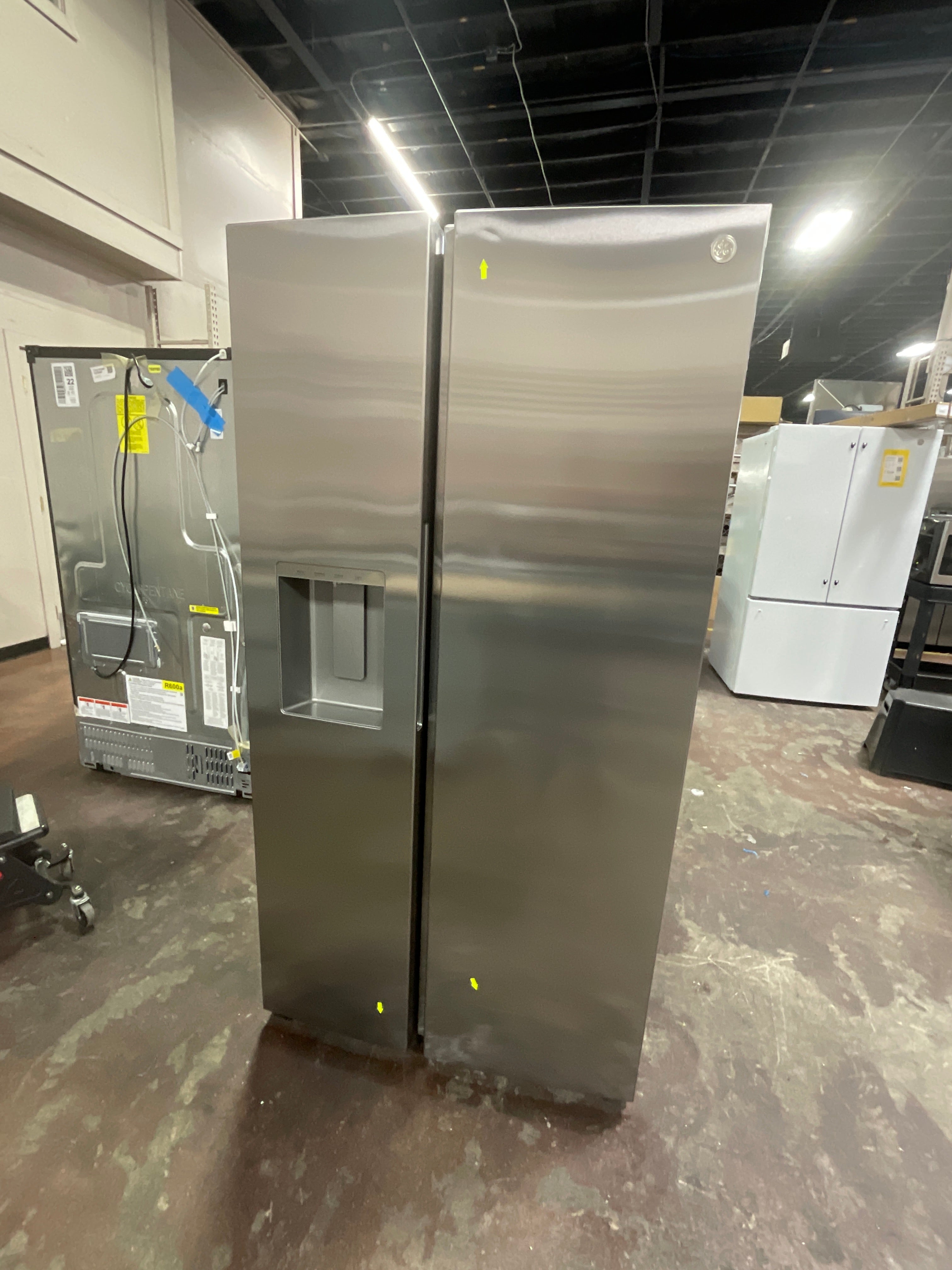 GE® 27.7 Cu. Ft. Side-By-Side Refrigerator with LED Light Walls, Extra Tall Dispenser, and Integrated Handles
