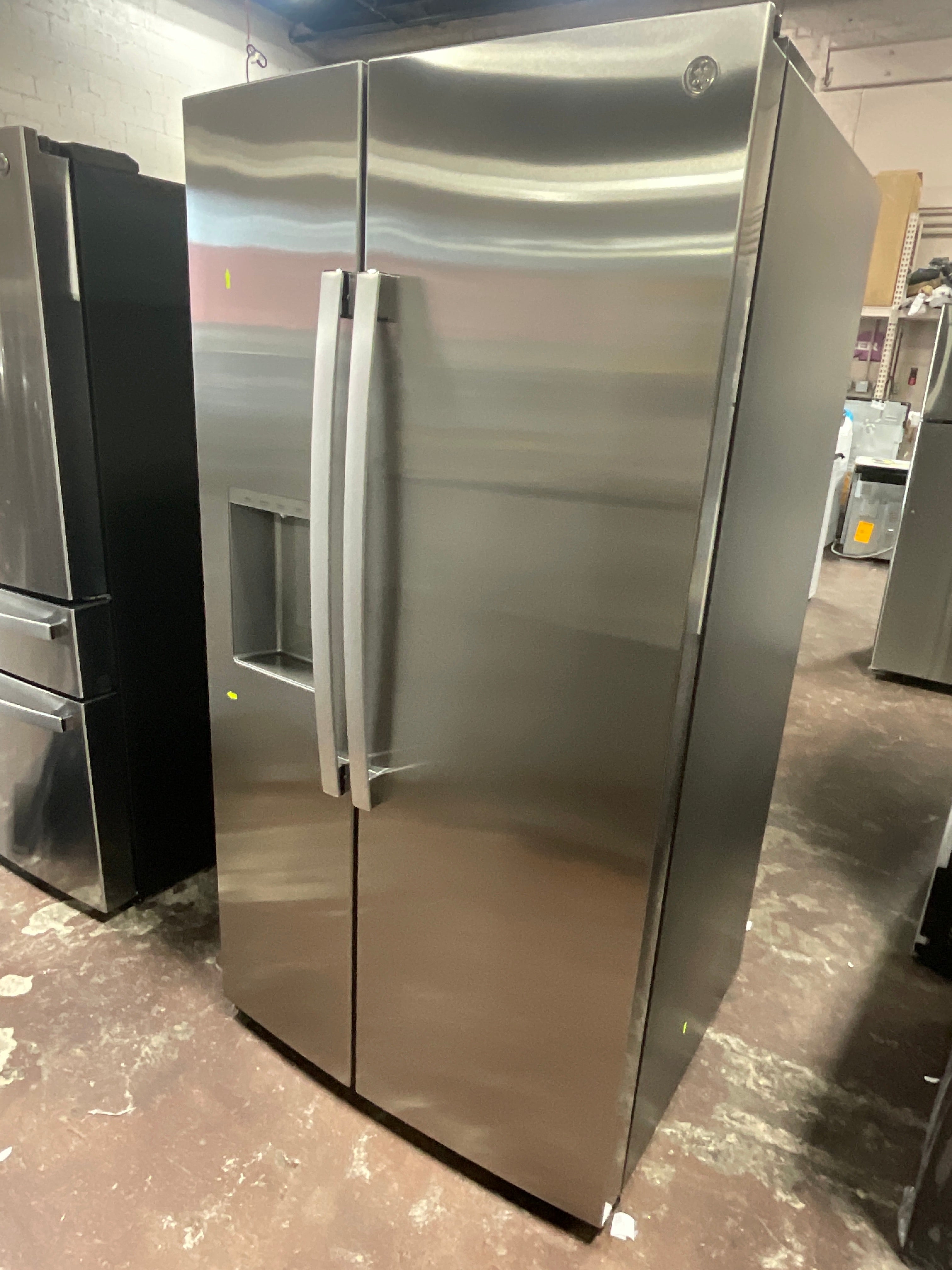 GE® 27.7 Cu. Ft. Side-By-Side Refrigerator with LED Light Walls, Extra Tall Dispenser, and Antimicrobial Refrigerator Drawer Liners