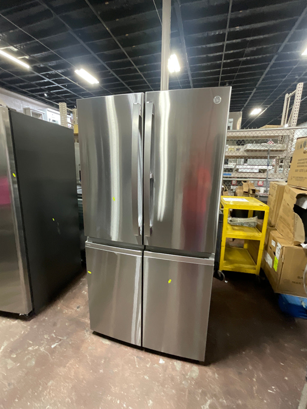 GE Profile™ ENERGY STAR® 22.9 Cu. Ft. Counter-Depth Quad-Door Refrigerator with Dual-Dispense AutoFill Pitcher and Door in Door