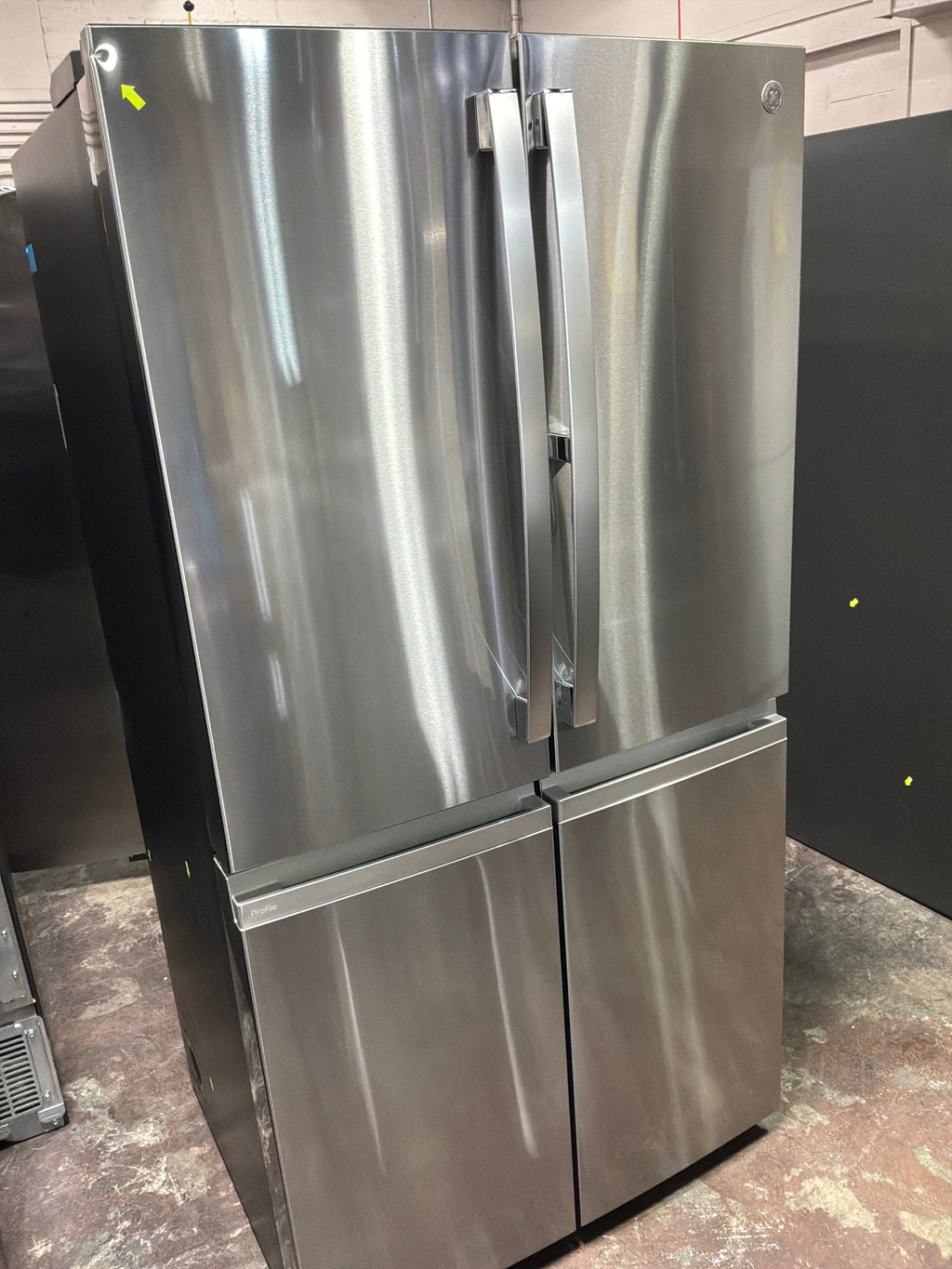 GE Profile™ ENERGY STAR® 22.9 Cu. Ft. Counter-Depth Quad-Door Refrigerator with Dual-Dispense AutoFill Pitcher and Door in Door