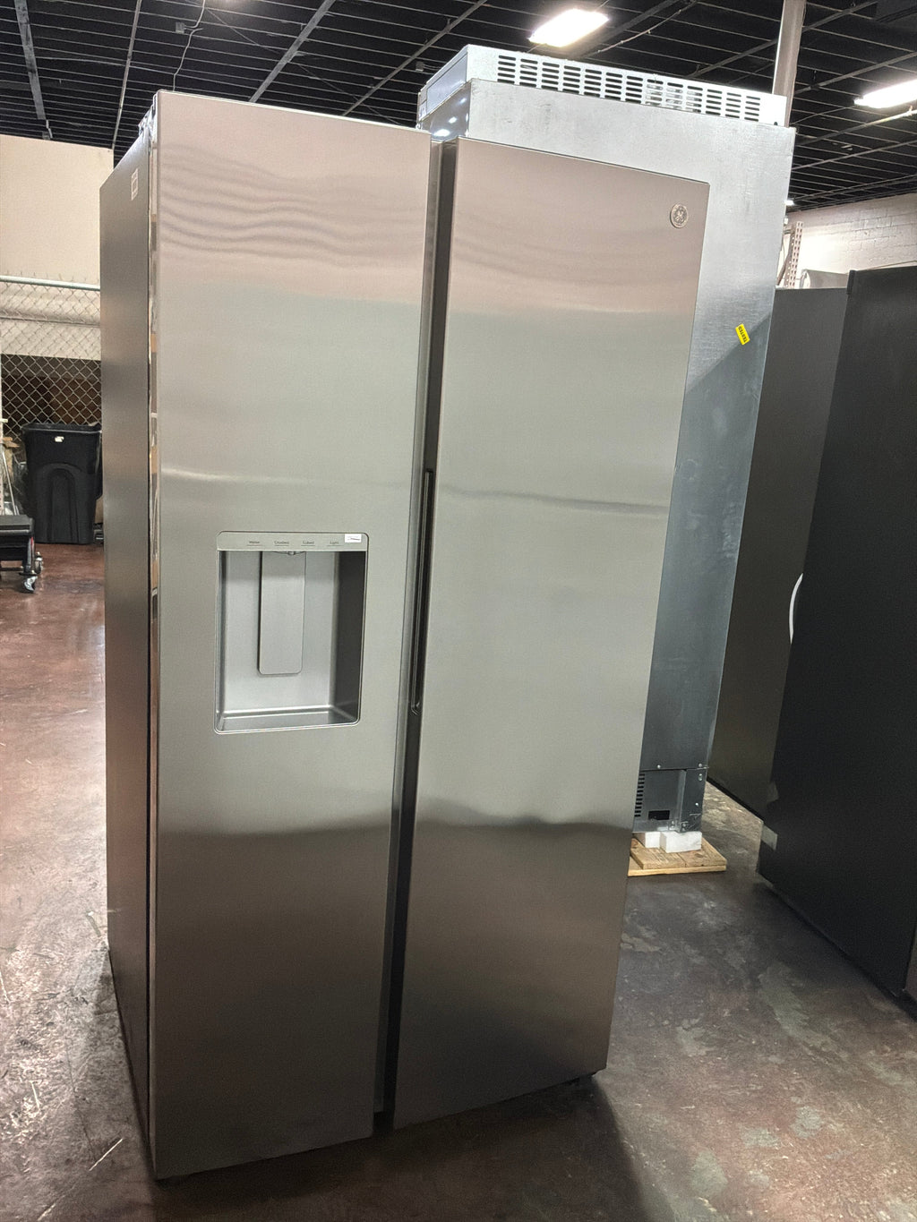 GE® 27.7 Cu. Ft. Side-By-Side Refrigerator with LED Light Walls, Extra Tall Dispenser, and Integrated Handles