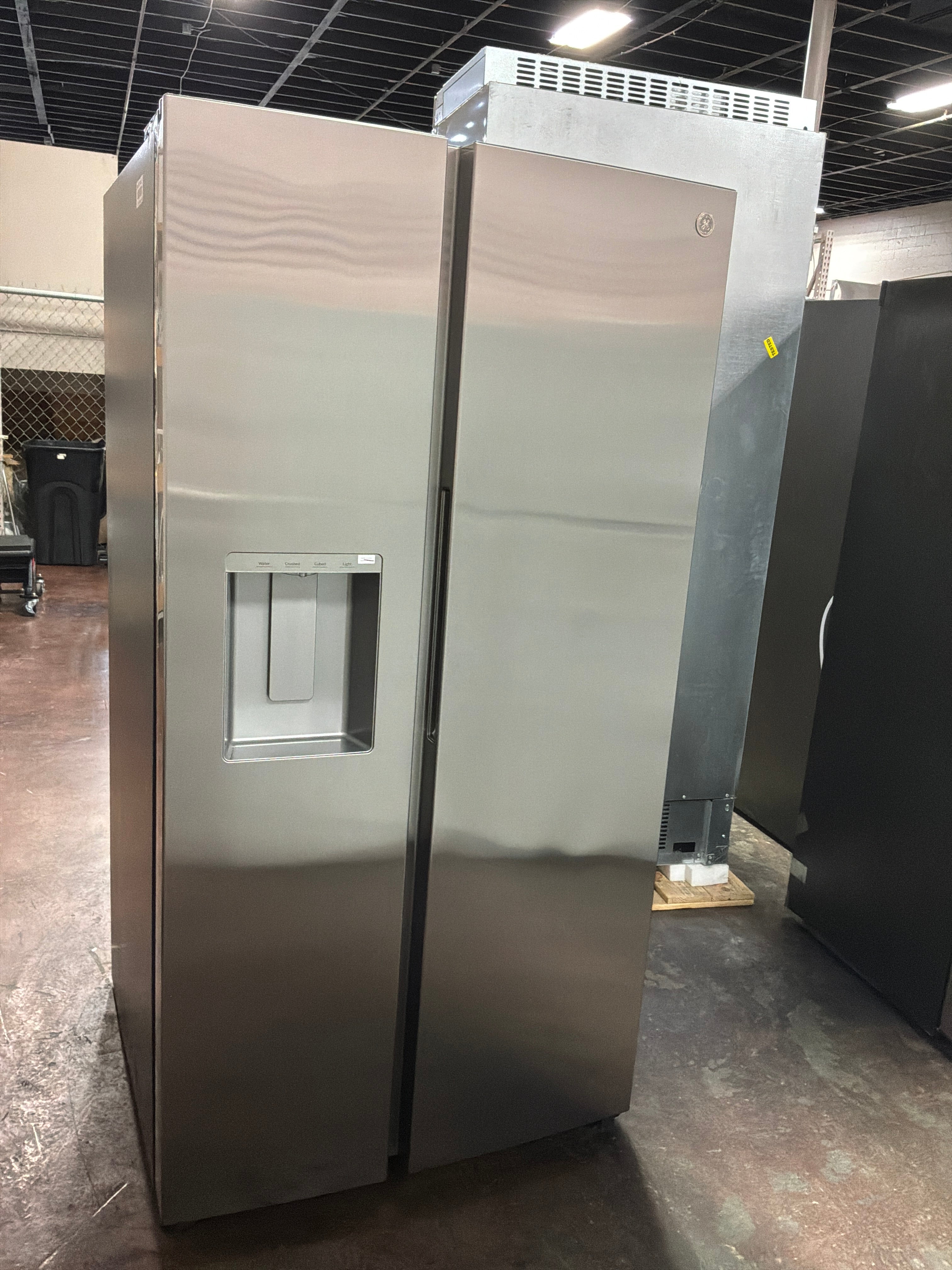 GE® 27.7 Cu. Ft. Side-By-Side Refrigerator with LED Light Walls, Extra Tall Dispenser, and Integrated Handles
