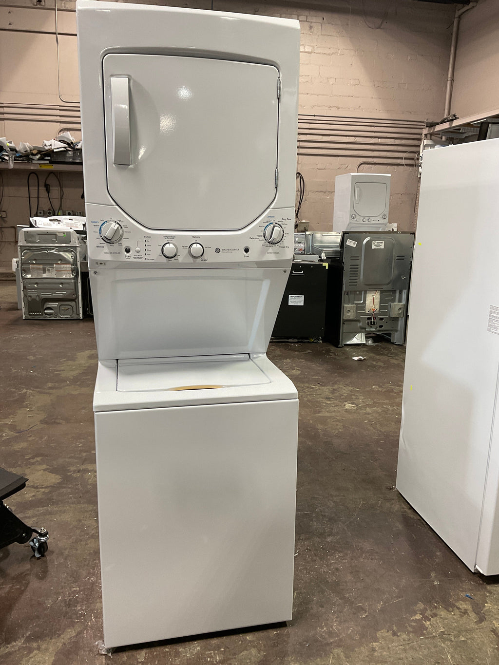GE Unitized Spacemaker® 2.3 cu. ft. Capacity Washer with Stainless Steel Basket and 4.4 cu. ft. Capacity Electric Dryer