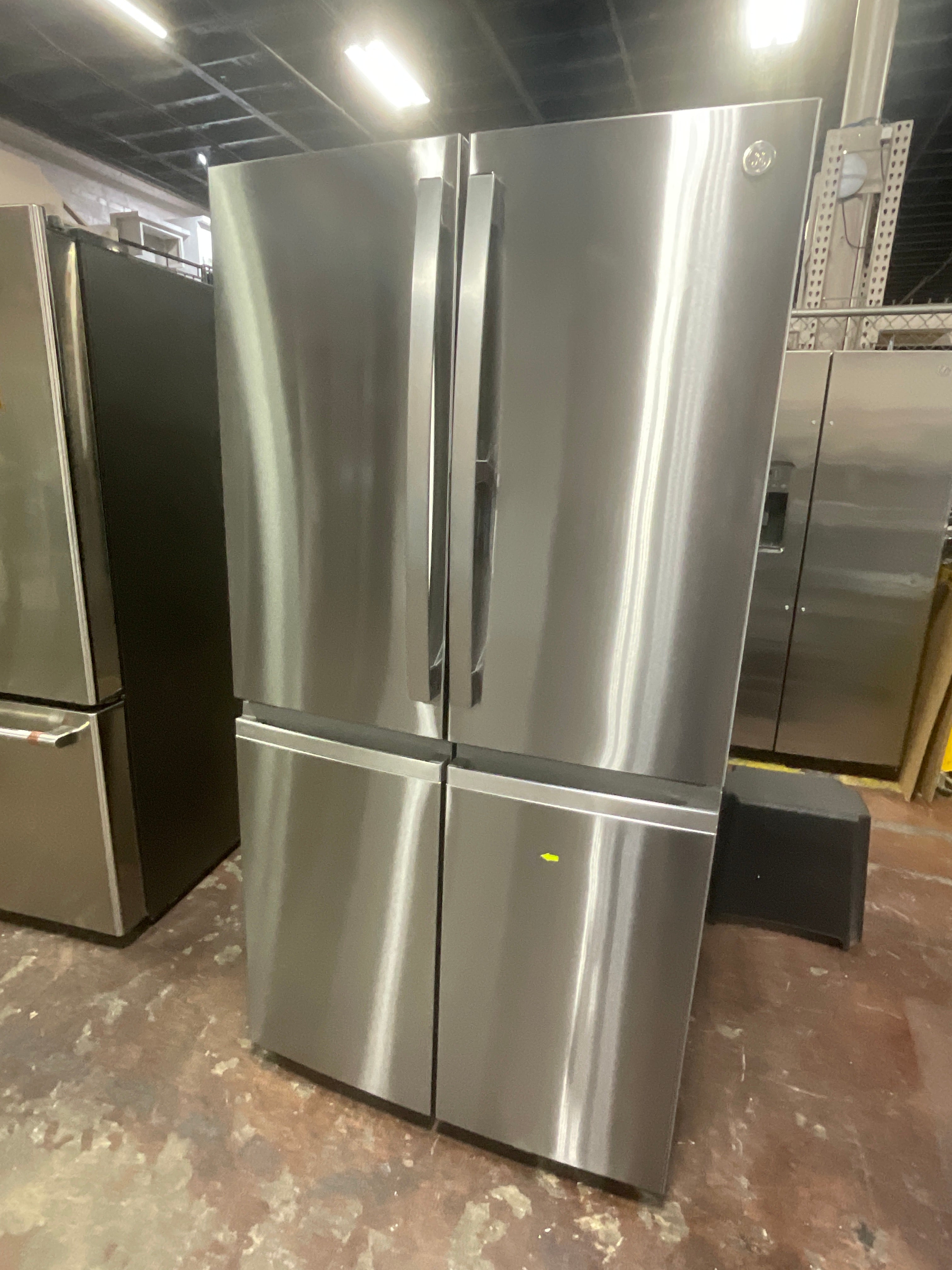 GE Profile™ ENERGY STAR® 28.4 Cu. Ft. Quad-Door Refrigerator with Dual-Dispense AutoFill Pitcher and Door in Door