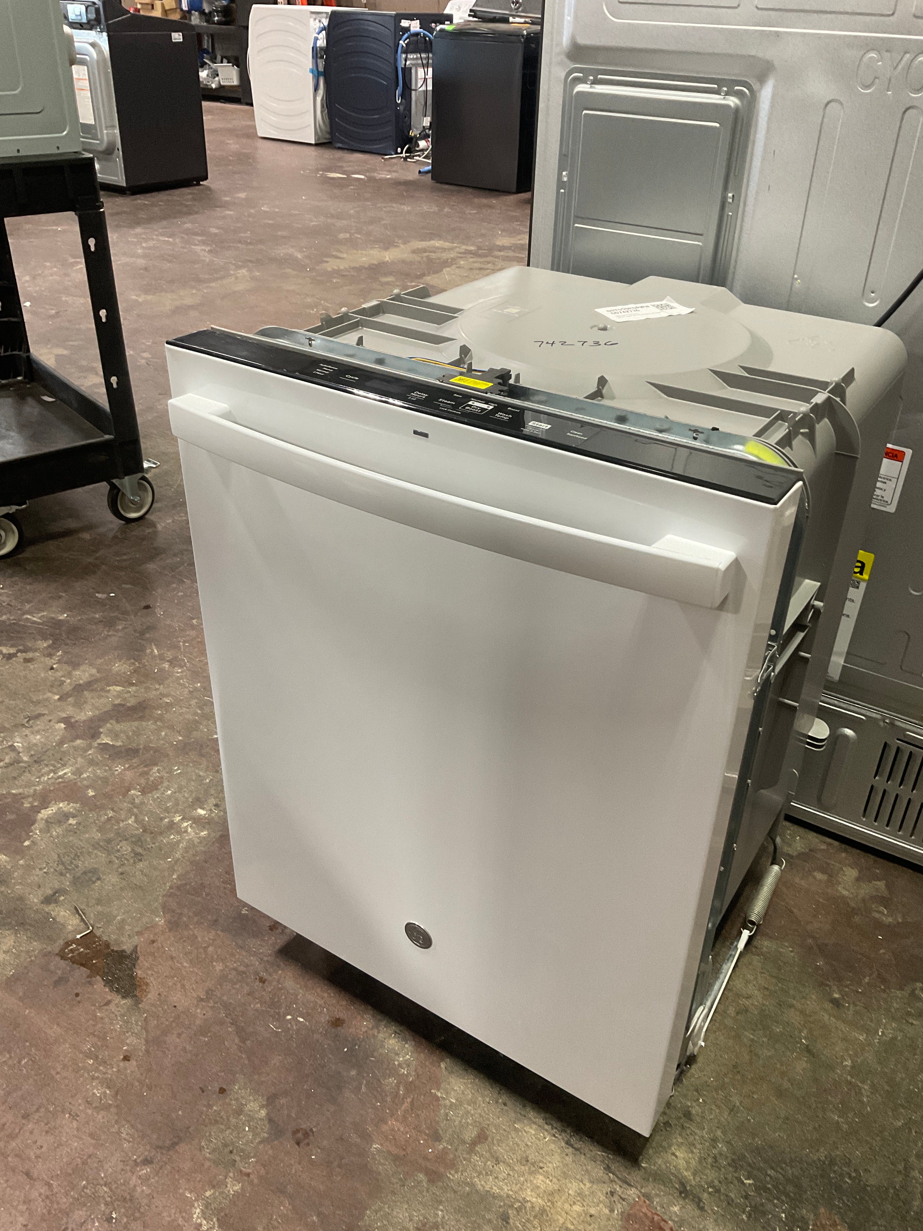 GE GE® ENERGY STAR® Top Control with Plastic Interior Dishwasher with Sanitize Cycle & Dry Boost