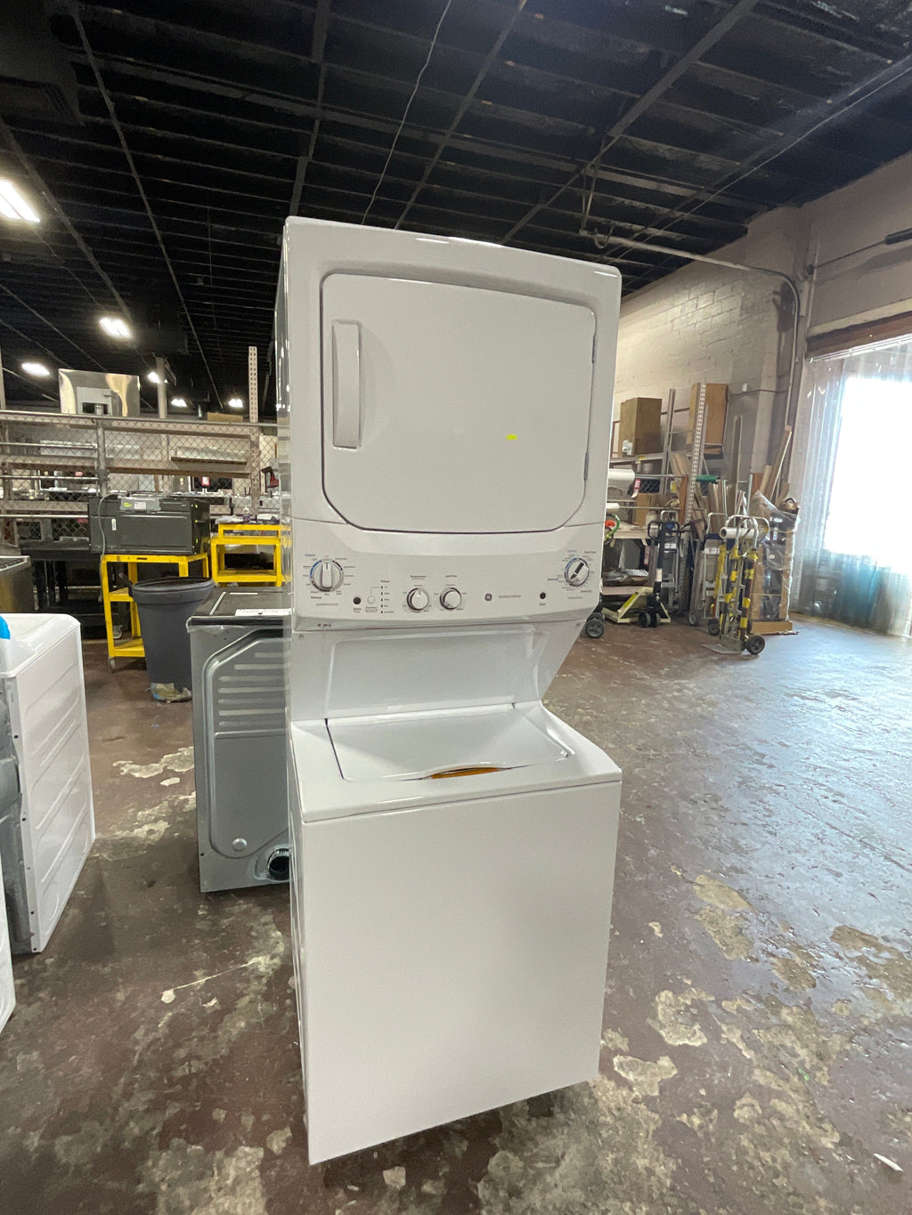 GE Unitized Spacemaker® 3.8 cu. ft. Capacity Washer with Stainless Steel Basket and 5.9 cu. ft. Capacity Electric Dryer